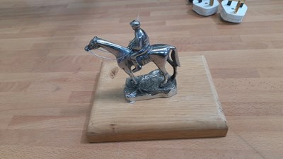 Lot 119 - HORSE & RIDER BONNET MASCOT BY DESMO MOUNTED ON OAK PLINTH