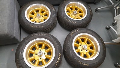 Lot 305 - SET OF 4 FORD 4 STUD ALLOY WHEELS & TYRES 205/60 R13