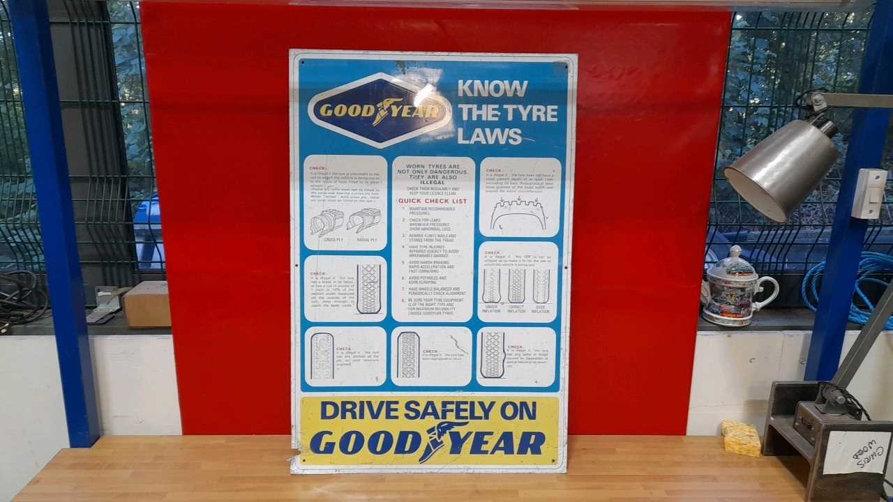 Lot 115 - GOODYEAR KNOW THE TYRE LAWS SIGN 30" x 20"