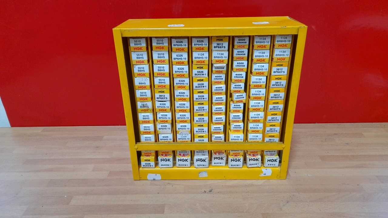 Lot 65 - N.G.K SPARK PLUG RACK COMPLETE WITH SPARK