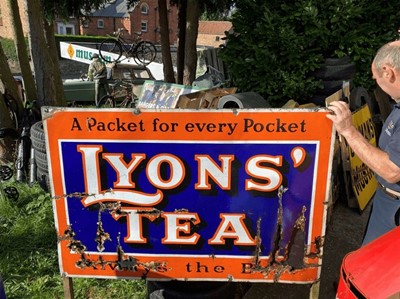 Lot 486 - LYONS TEA SIGN ON WOOD FRAME