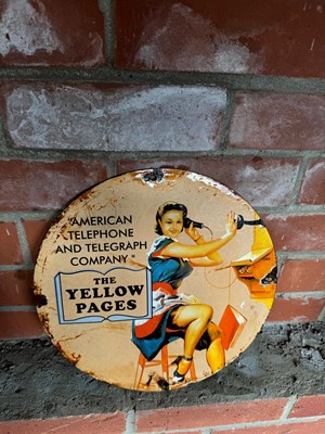 Lot 279 - YELLOW PAGES ENAMEL SIGN 12" DIAMETER