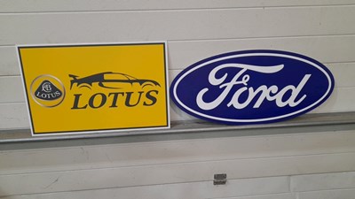 Lot 679 - PLASTIC WALL FILLER SIGNS FORD & LOTUS