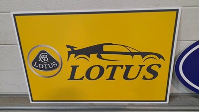 Lot 679 - PLASTIC WALL FILLER SIGNS FORD & LOTUS