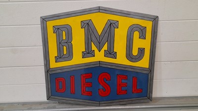 Lot 717 - HAND PAINTED B.M.C. DIESEL ON METAL 26" X 24"