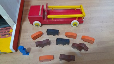 Lot 563 - WOODEN CHILD'S GARAGE + WOODEN TRUCK WITH ANIMALS