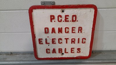 Lot 95 - CAST IRON P.C.E.D DANGER ELECTRIC CABLES SIGN 12" X 11"