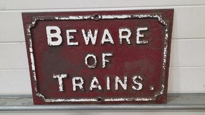 Lot 111 - BEWARE OF TRAINS CAST IRON SIGN 22" X 15"