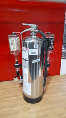 Lot 679 - CHROME FIRE EXTINGUISHER WITH 2 OPTICS 24" X 15"