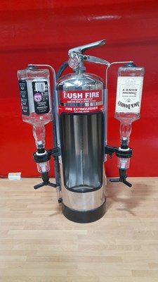 Lot 679 - CHROME FIRE EXTINGUISHER WITH 2 OPTICS 24" X 15"