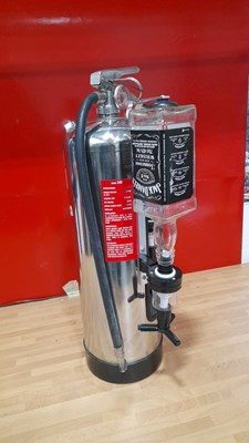 Lot 679 - CHROME FIRE EXTINGUISHER WITH 2 OPTICS 24" X 15"