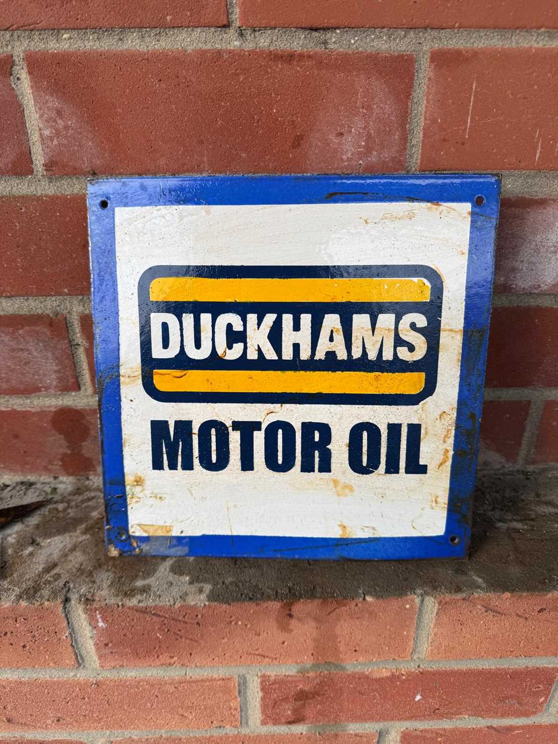Click for high resolution Lot 75 - DUCKHAMS MOTOR OIL ENAMEL SIGN 9.5" X 9.5"