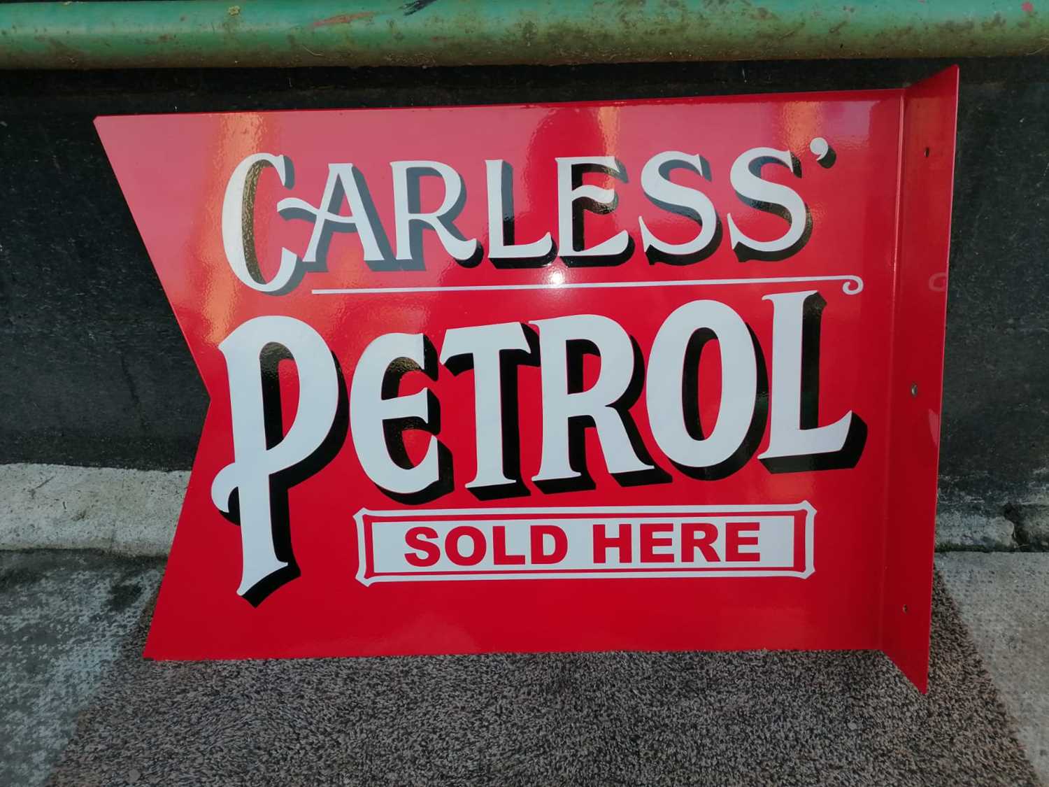 Lot 558 - CARLESS PETROL SOLD HERE DOUBLE-SIDED SIGN