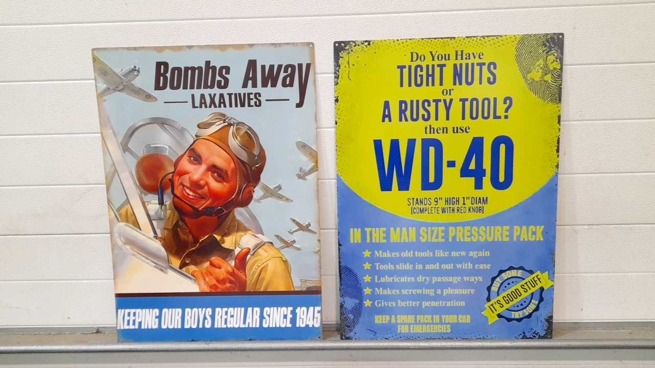Lot 419 - METAL REPRO " RUSTY NUTS " & " BOMBS AWAY " SIGNS 27" X 20"