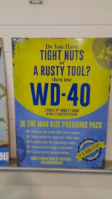 Lot 419 - METAL REPRO " RUSTY NUTS " & " BOMBS AWAY " SIGNS 27" X 20"