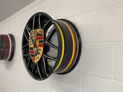 Lot 125 - PORSCHE ALLOY WHEEL CLOCK