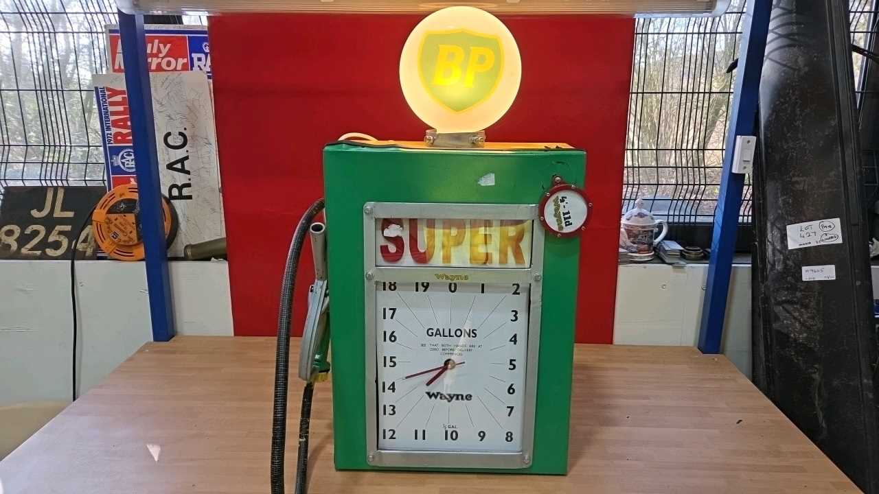 Lot 671 - SUPER MINI PUMP WITH SMALL GLASS BP GLOBE 32" X 16"