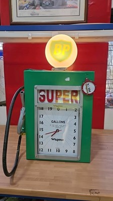 Lot 671 - SUPER MINI PUMP WITH SMALL GLASS BP GLOBE 32" X 16"