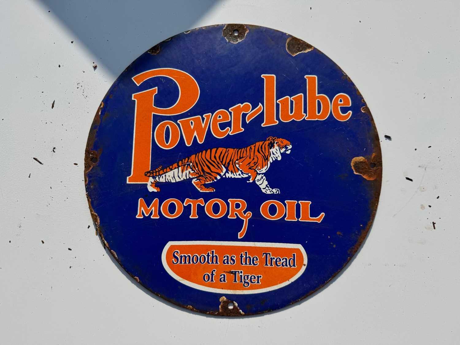 Lot 93 - POWER-LUBE MOTOR OIL ENAMEL SIGN 12" DIA