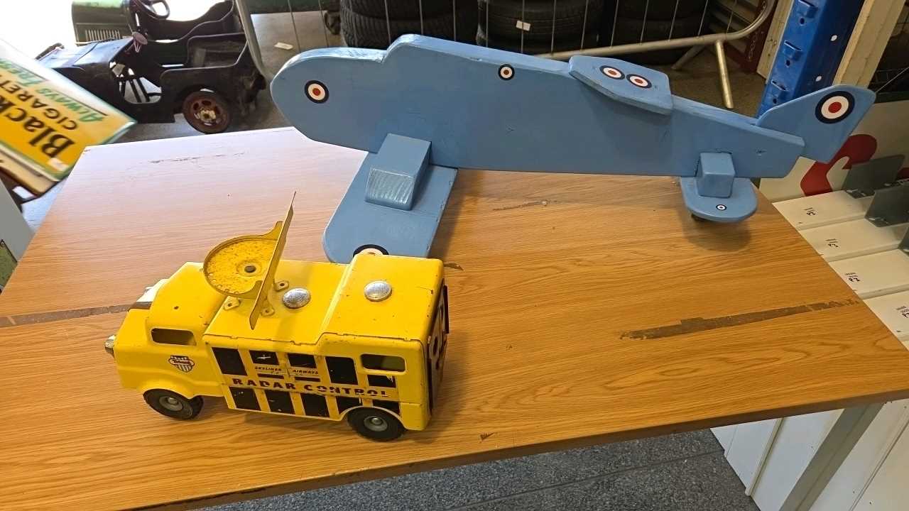Lot 659 - RADAR CONTROL TIN TRUCK & WOODEN SPITFIRE PLANE