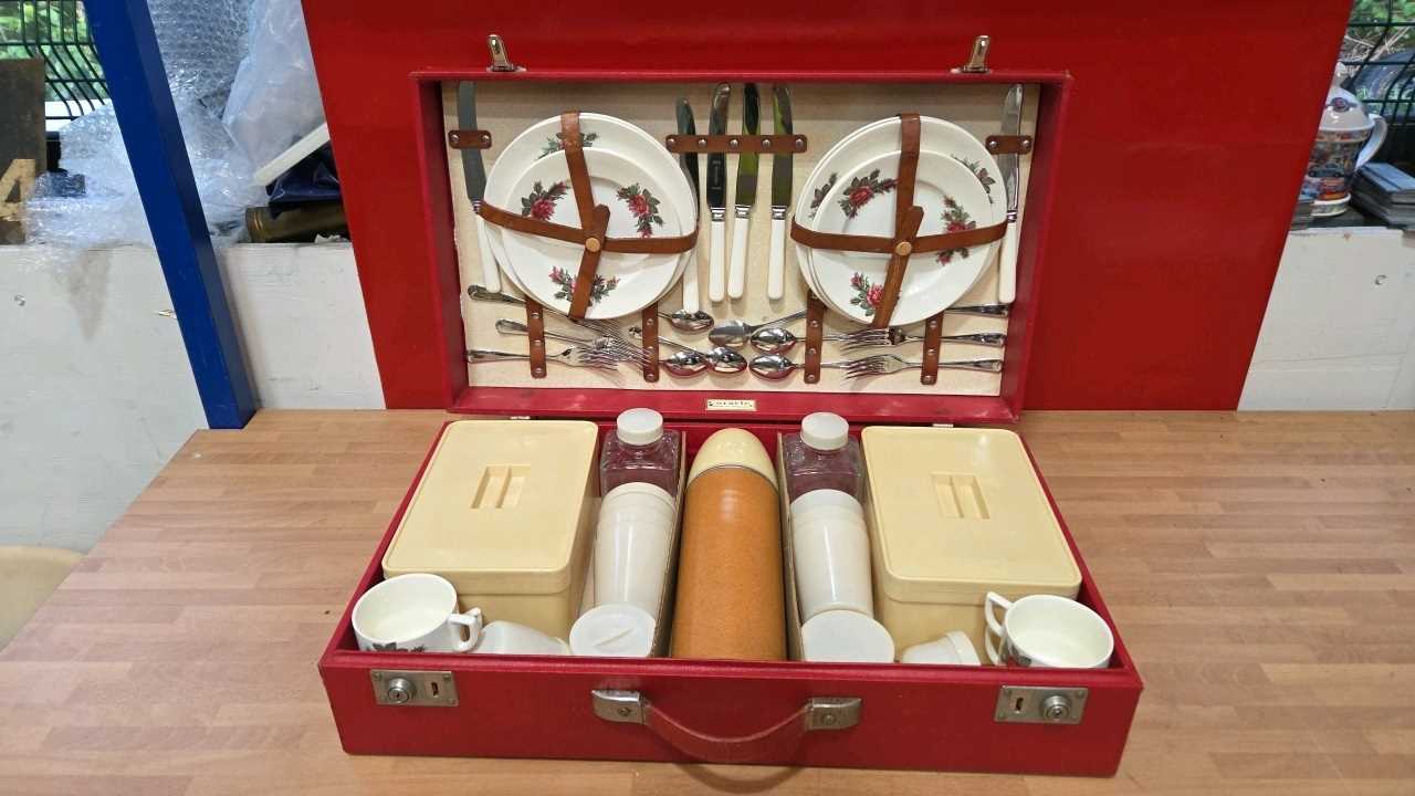 Lot 97 - CORACLE RED PICNIC SET