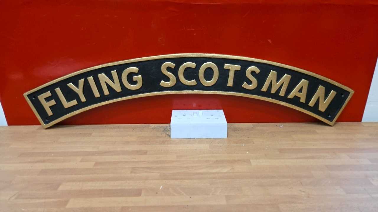 Lot 257 - FLYING SCOTSMAN CAST IRON SIGN 35" X 7"