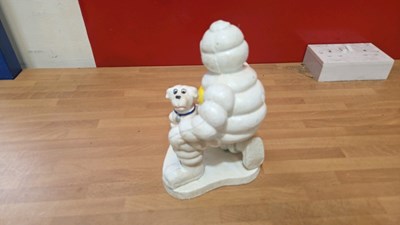 Lot 807 - CAST MICHELIN MAN & DOG 8" X 6"