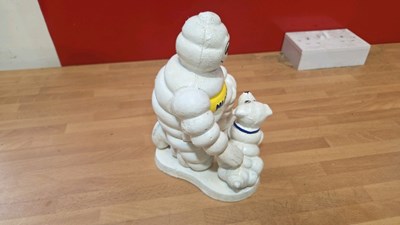 Lot 807 - CAST MICHELIN MAN & DOG 8" X 6"