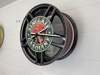 Lot 627 - PIN-UP GIRL ALLOY WHEEL CLOCK