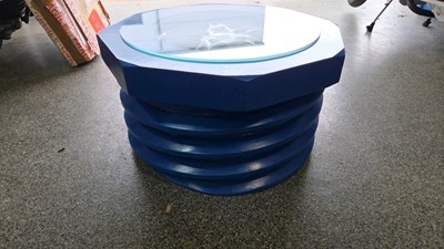 Lot 143 - CONCEPT COFFEE TABLE,IN THE FORM OF A NUT & THREAD, ROUND A PORSCHE WHEEL
