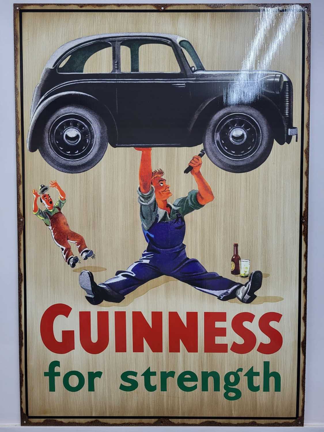 Lot 449 - HANDMADE VINTAGE GUINNESS FOR STRENGTH CAR SIGN 39" x 27"