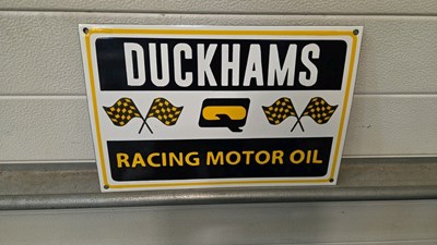 Lot 281 - DUCKHAMS RACING MOTOR OIL ENAMEL SIGN 15" X 12"