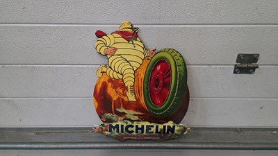 Lot 265 - MICHELIN MAN ON A TYRE ENAMEL SIGN 16" X 12"