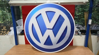 Lot 505 - VOLKSWAGON LOGO PERSPEX PRINTED SIGN 33" DIA