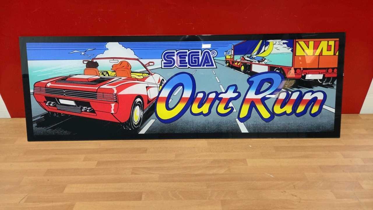 Lot 459 - OUTRUN ARCADE GAME , PERSPEX PRINTED SIGN 32" X 10"