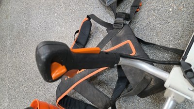 Lot 551 - STHIL FS400 STRIMMER WITH HARNESS & STHIL PROTECTIVE HELMET