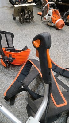 Lot 551 - STHIL FS400 STRIMMER WITH HARNESS & STHIL PROTECTIVE HELMET