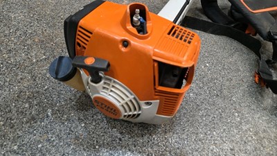 Lot 551 - STHIL FS400 STRIMMER WITH HARNESS & STHIL PROTECTIVE HELMET