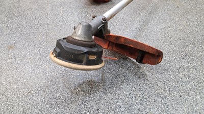 Lot 551 - STHIL FS400 STRIMMER WITH HARNESS & STHIL PROTECTIVE HELMET