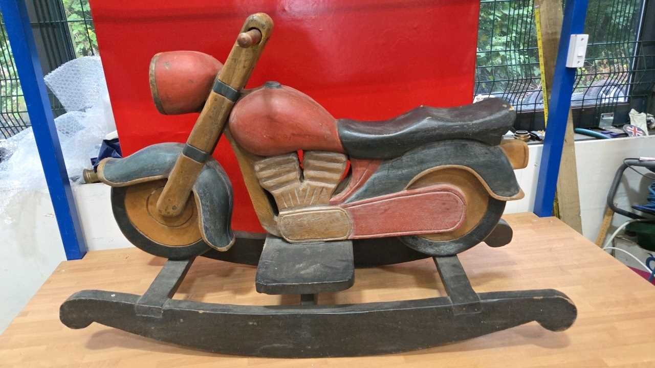Lot 581 - SOLID WOOD MOTOR CYCLE ROCKER