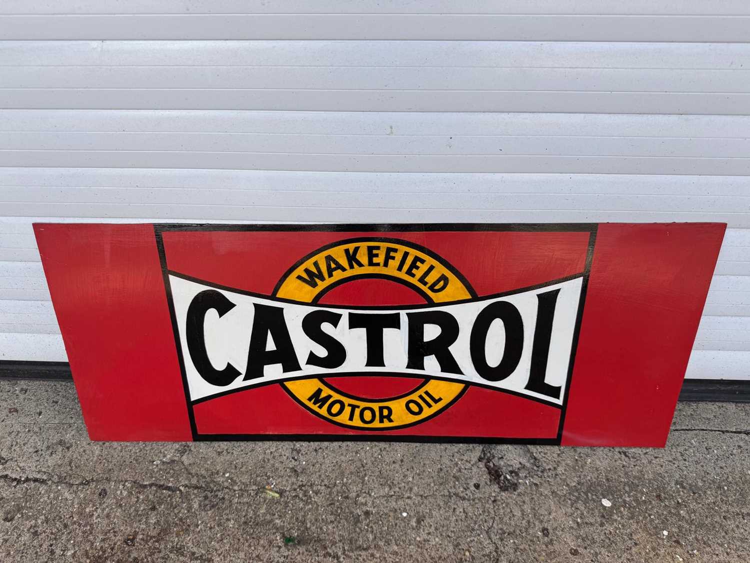 Lot 747 - CASTROL WAKEFIELD MOTOR OIL PAINTED SIGN 36"