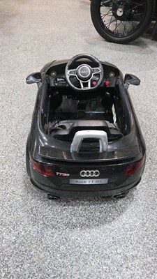 Lot 108 - AUDI TT RS CHILD'S ELECTRIC CAR WITH MP3 PLAYER