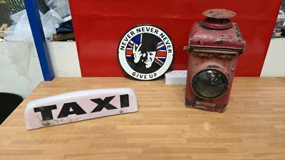 Lot 739 - OLD CAST LAMP , TAXI LIGHT & ENAMEL NEVER NEVER GIVE UP SIGN