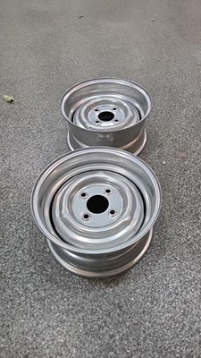 Lot 569 - PAIR OF NEW UNUSED FORD 6J 13" STEEL WHEEL RIMS