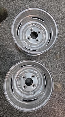 Lot 569 - PAIR OF NEW UNUSED FORD 6J 13" STEEL WHEEL RIMS