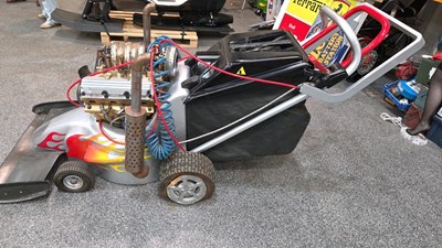 Lot 415 - EXTRA LARGE MOWER, PROP FROM THE SKODA OCTAVIA VRS TV ADVERT