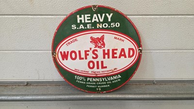 Lot 391 - WOLF'S HEAD OIL ENAMEL SIGN 12" DIA