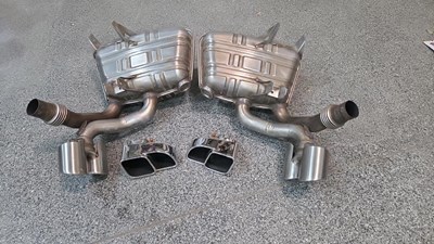 Lot 509 - PAIR OF NEW OLD STOCK PORSCHE 911 TURBO EXHAUST PIPE SILENCERS