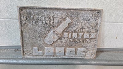Lot 849 - SINTAX PLUGS CAST SIGN 12" X 8"