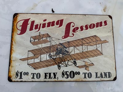 Lot 241 - FLYING LESSONS SIGN 17.5" X 12"